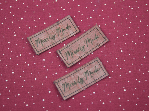 Merrily Made Mini Tags on Cork